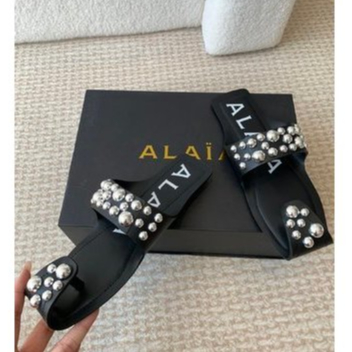 Sandals, made of black leather with diamond rivets, lined with ...