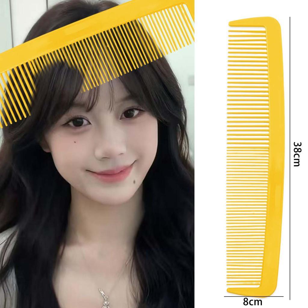 This giant, colorful plastic prop comb is suitable for everyday use ...
