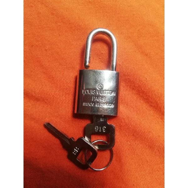 LOUIS VUITTON LOCK WITH KEYS