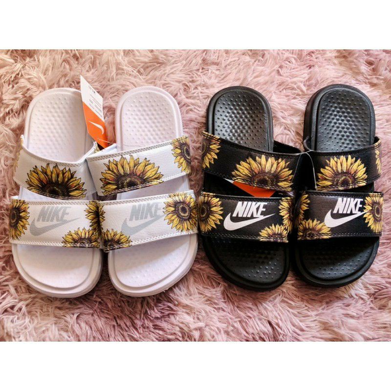 Nike sunflower hot sale flip flops