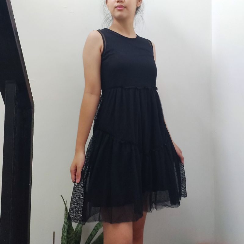 Black dress with outlet mesh bottom