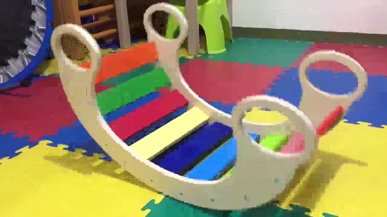 wooden rainbow rocker designed for kids vestibular sensory play ...