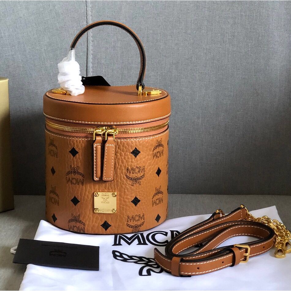 Round best sale mcm bag