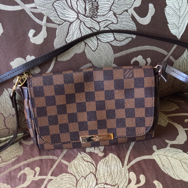 Damier ebene outlet sling bag