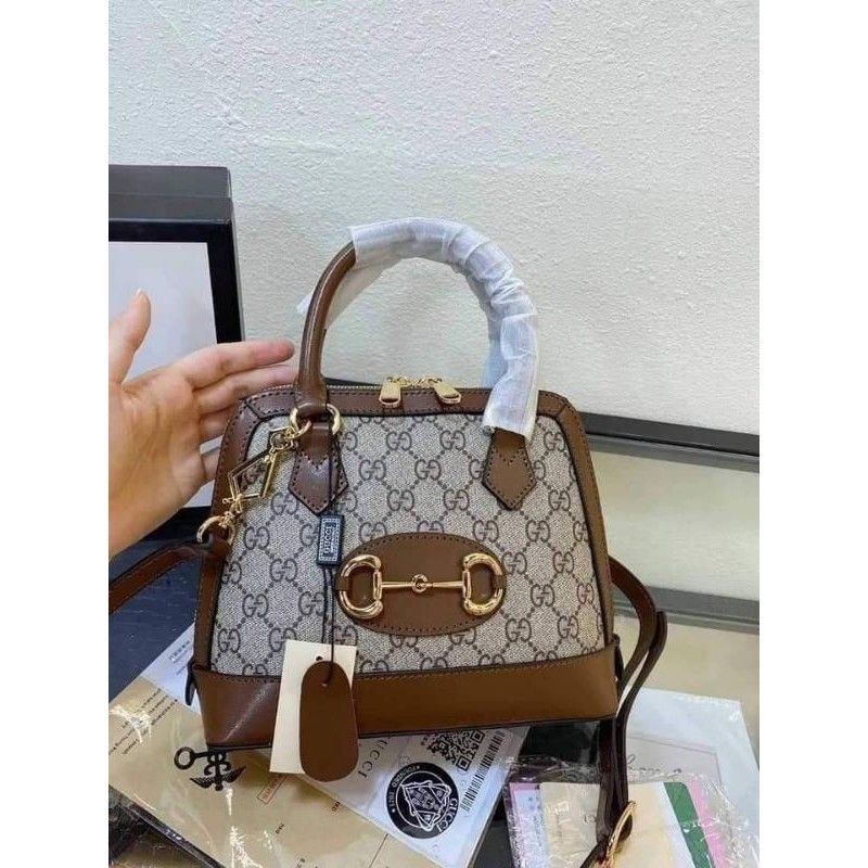 GUCCI ALMA SLING BAG