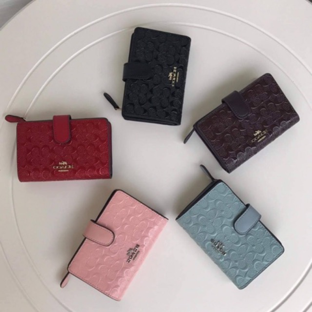 Coach wallet embossed hot sale