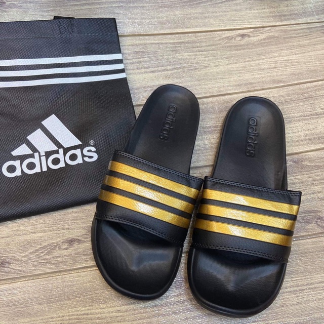 Adidas hotsell gold slides