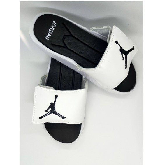 Black and best sale white jordan sandals