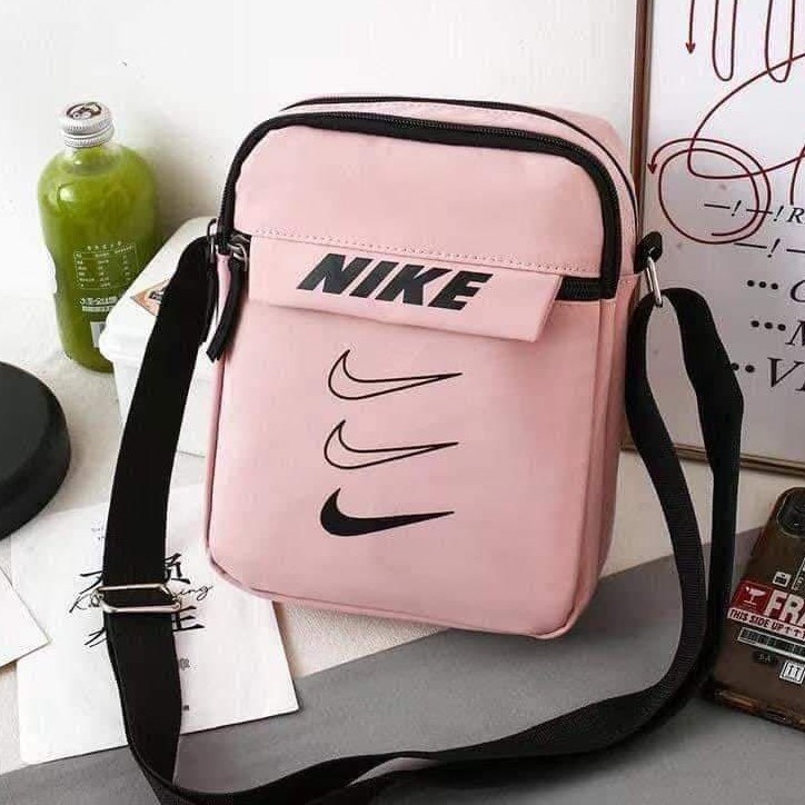 Nike pink sling discount bag