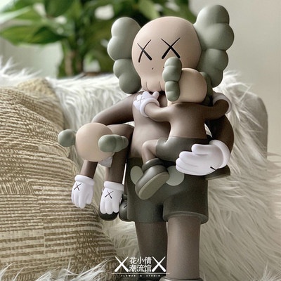 Kaws store hugging dolls