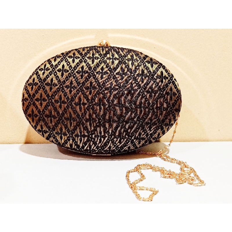 Oval shaped clutch party wear Shopee Philippines