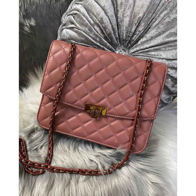 Quilted push lock discount bag