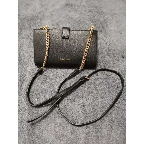 Calvin Klein phone crossbody, Luxury, Bags & Wallets on Carousell