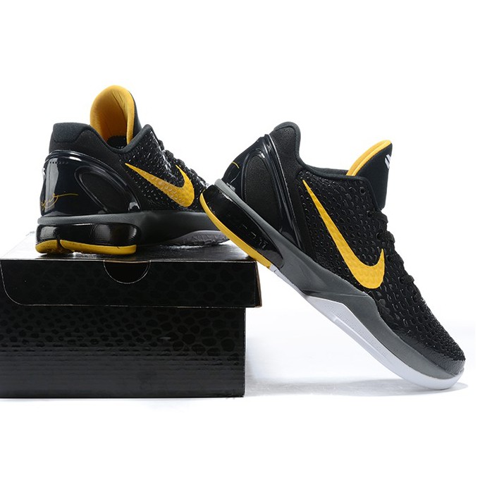 Nike black and 2025 yellow basketball shoes