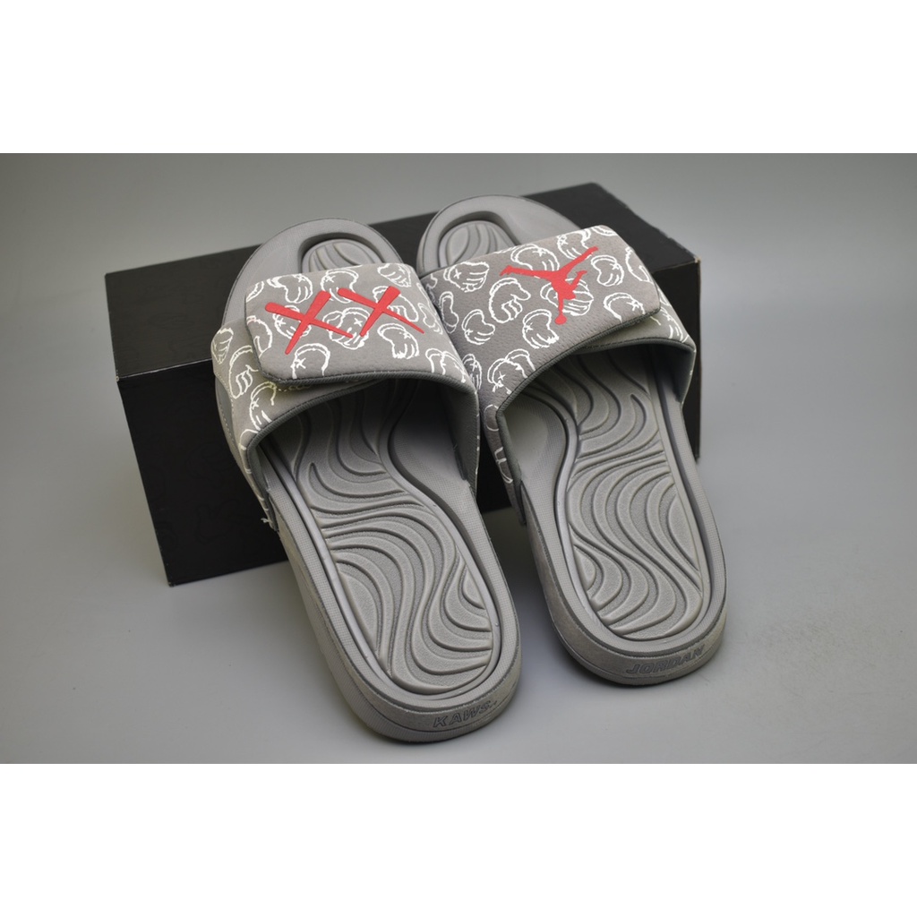 Jordan hot sale kaws slides