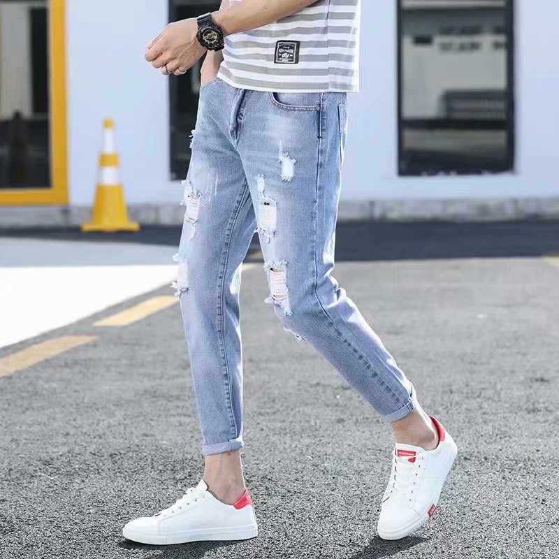 Ankle length ripped sales jeans