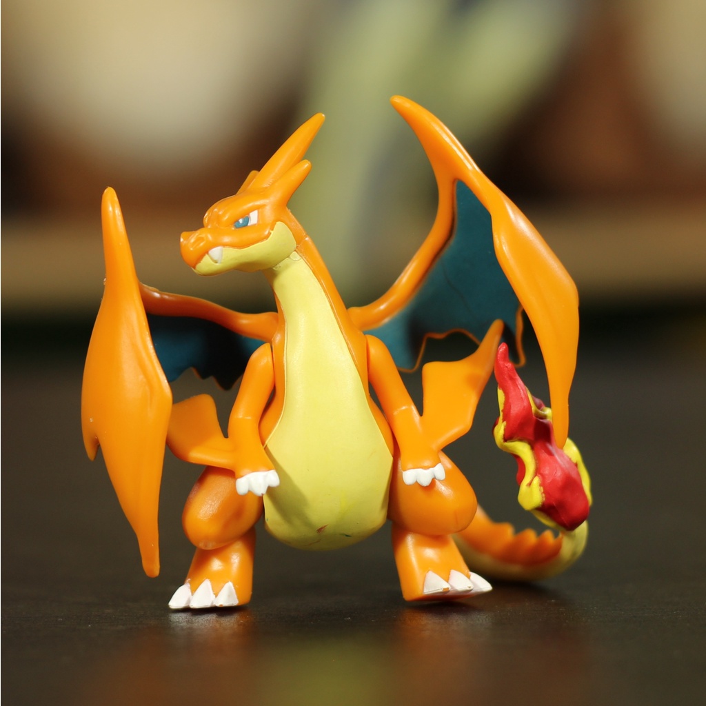 Takara deals tomy charizard