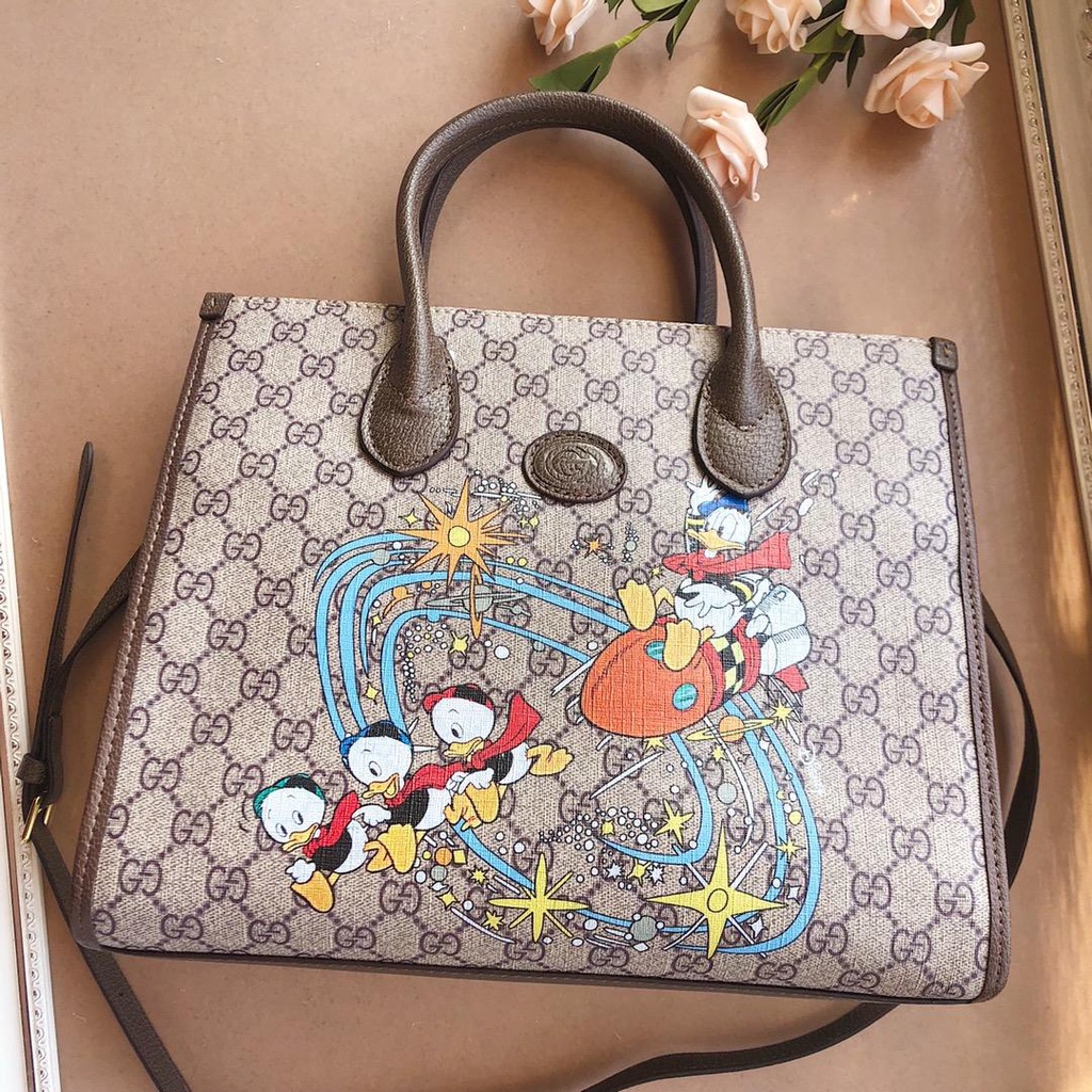 Gucci donald best sale duck purse