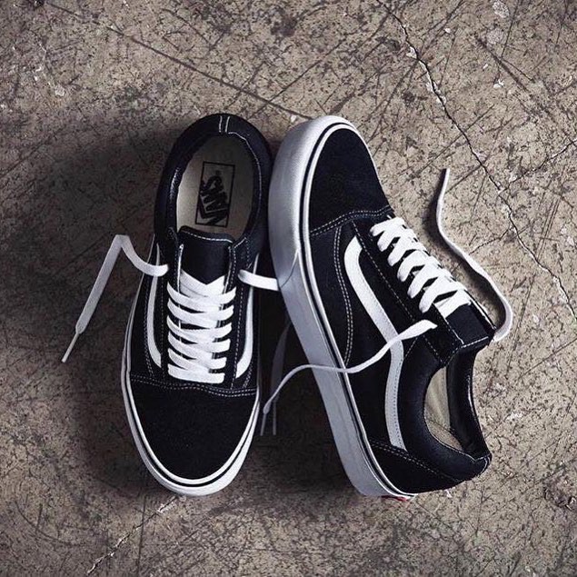 White vans with on sale black vans writing