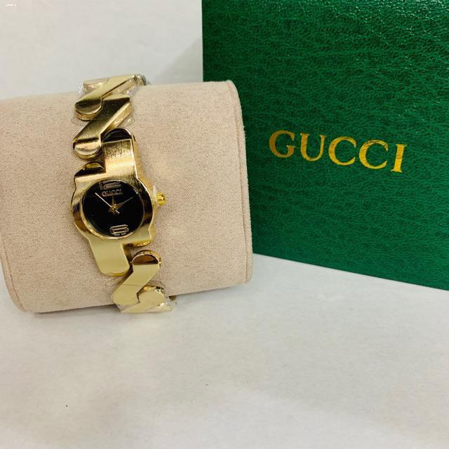 Gucci relo price hot sale