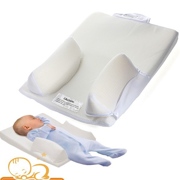 Newborn sleep positioner finned anti roll pillow