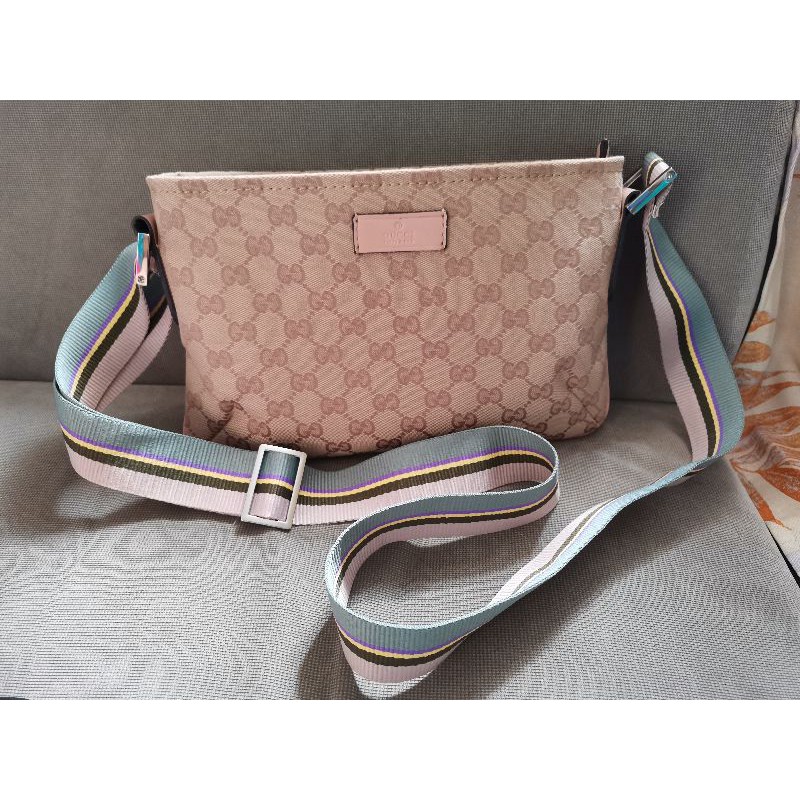 Gucci canvas hotsell sling bag