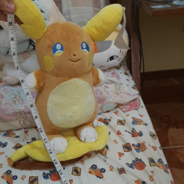 Alolan raichu best sale stuffed animal