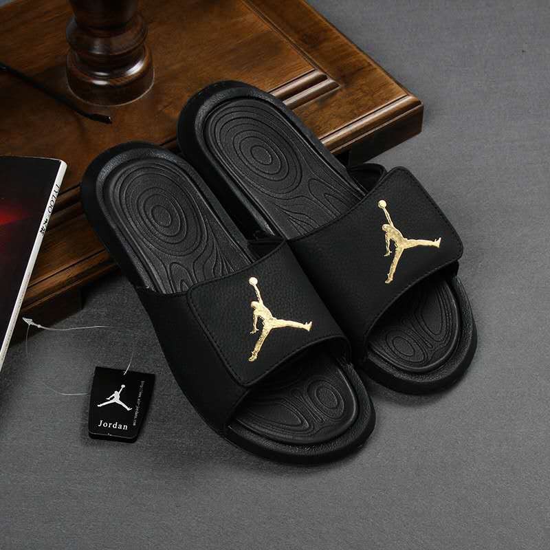 black and gold jordan sandals