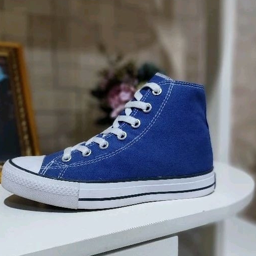 Bright hot sale blue converse