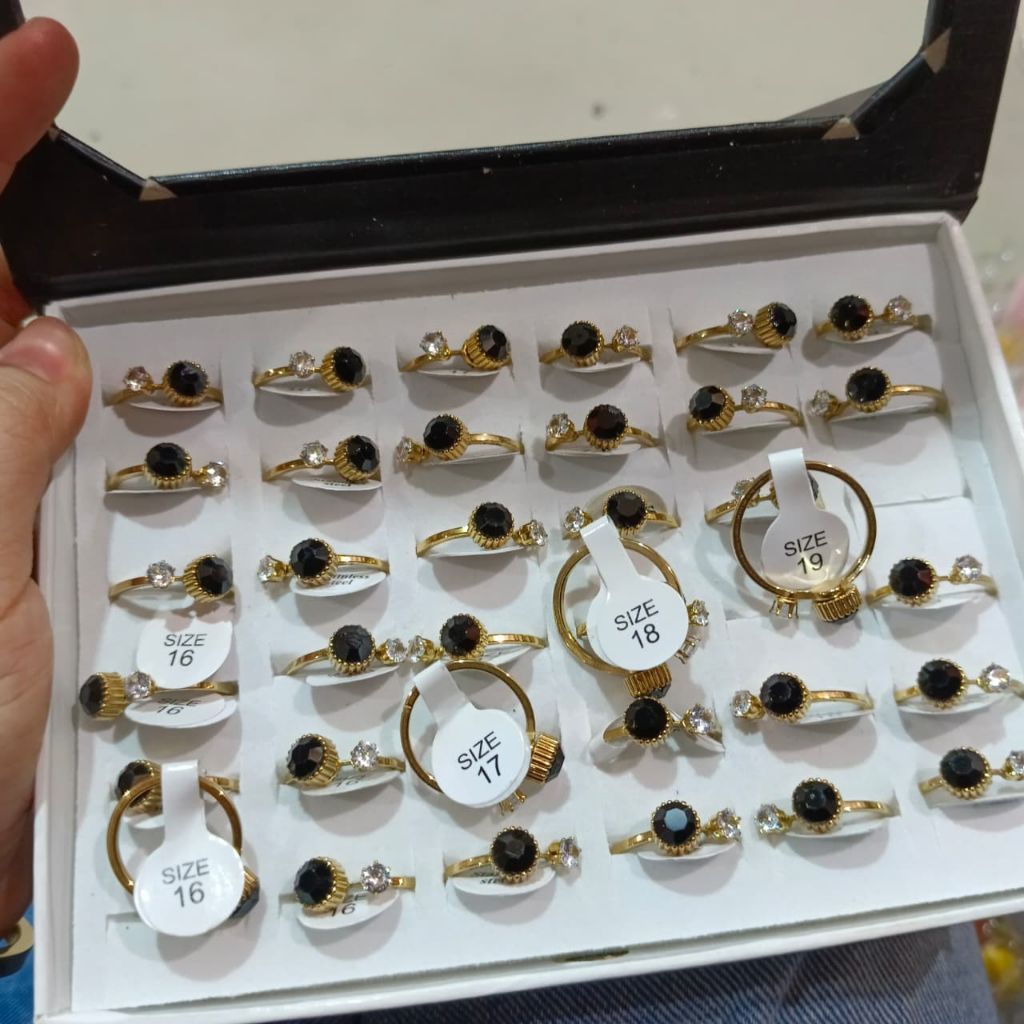 Black Ionic spiral titanium Ring with gold Gemstones (36 pcs) | Shopee ...