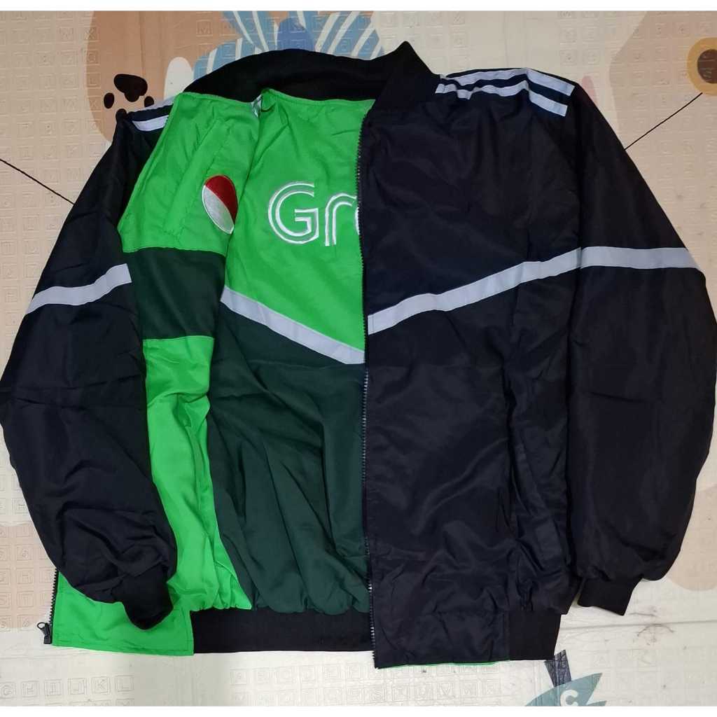 GRAB REVERSIBLE BLACK JACKET WITH WATERPROOF LIST, CAN BE WORN BY ...