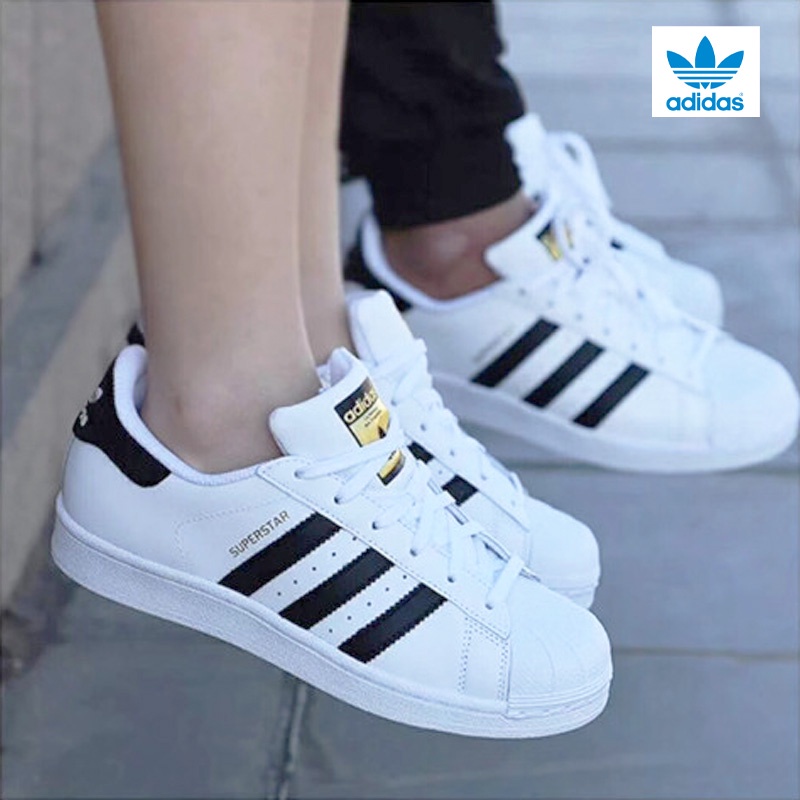 Adidas white rubber store shoes