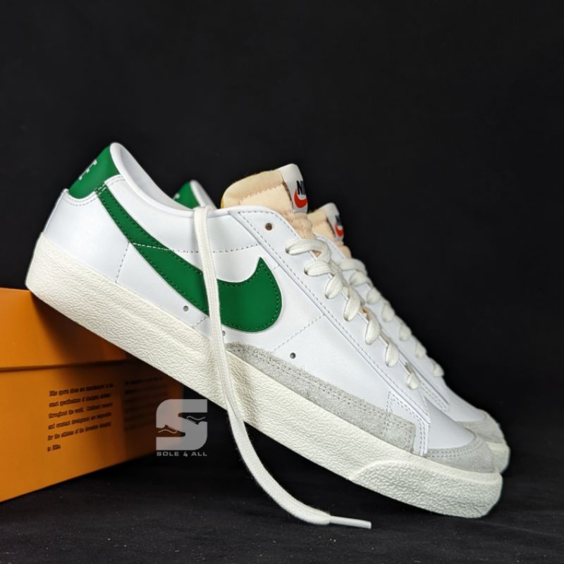 white and green nike blazers