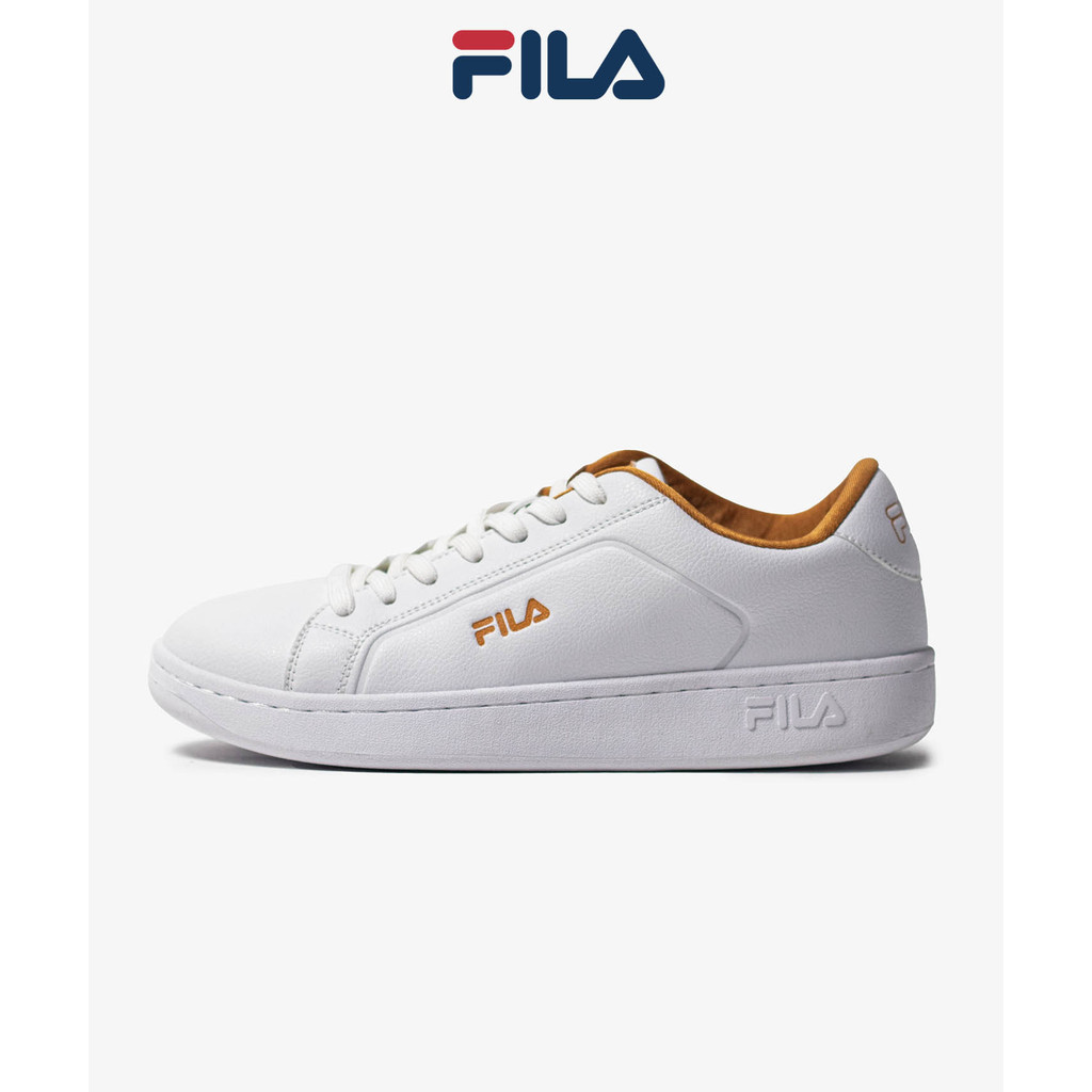 Fila white and gold sneakers hotsell