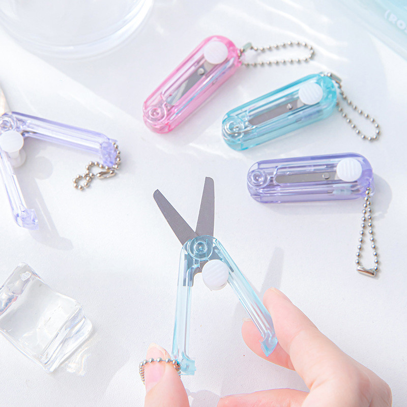 A Transparent Mini Scissors Retractable Folding Portable Scissors ...