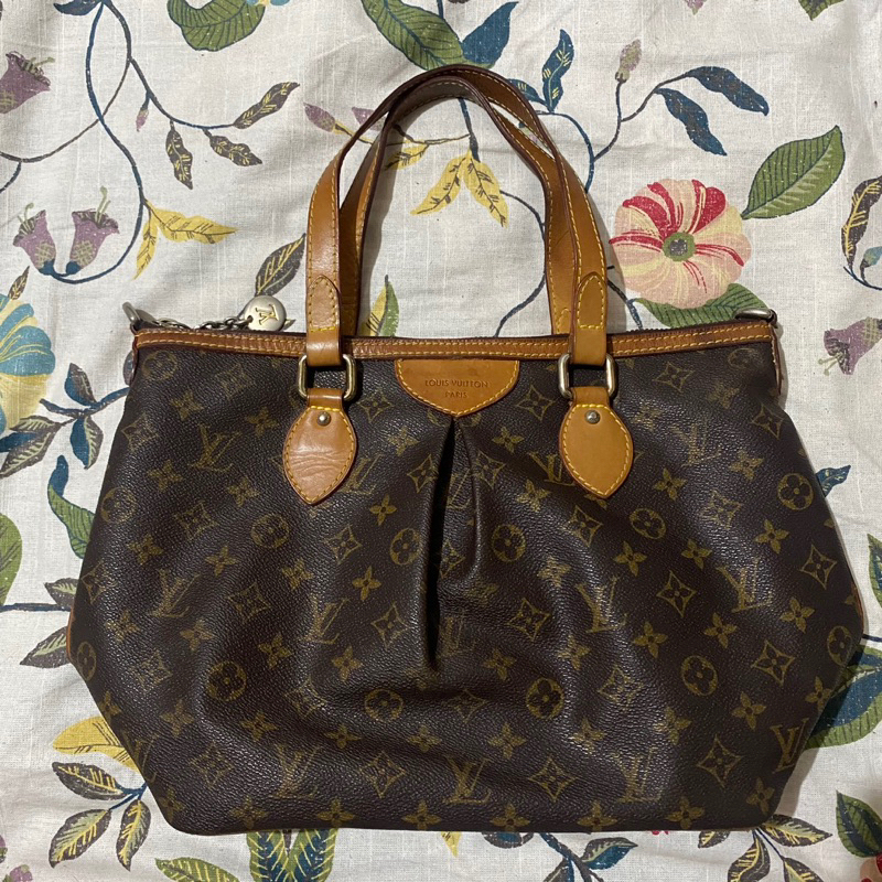 Two is always better than one! This Louis Vuitton Palermo is one