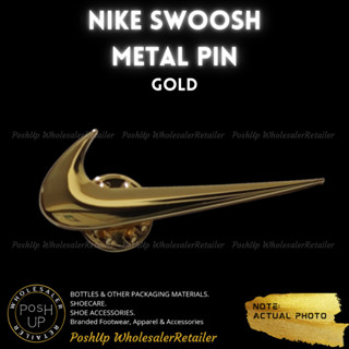 Gold nike swoosh on sale pin