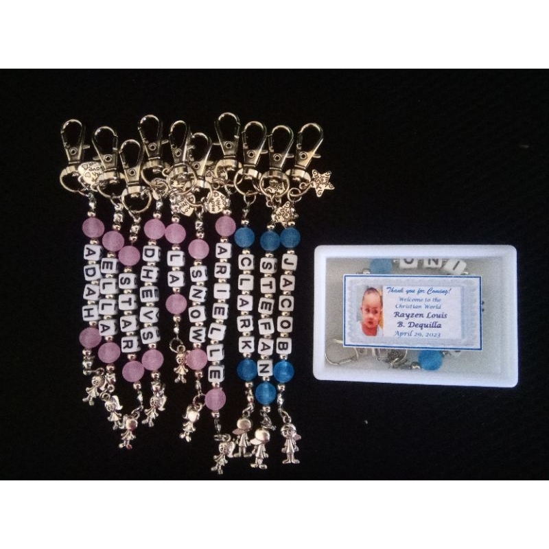 Personalized lobster keychain with name and charm in acrylic box with