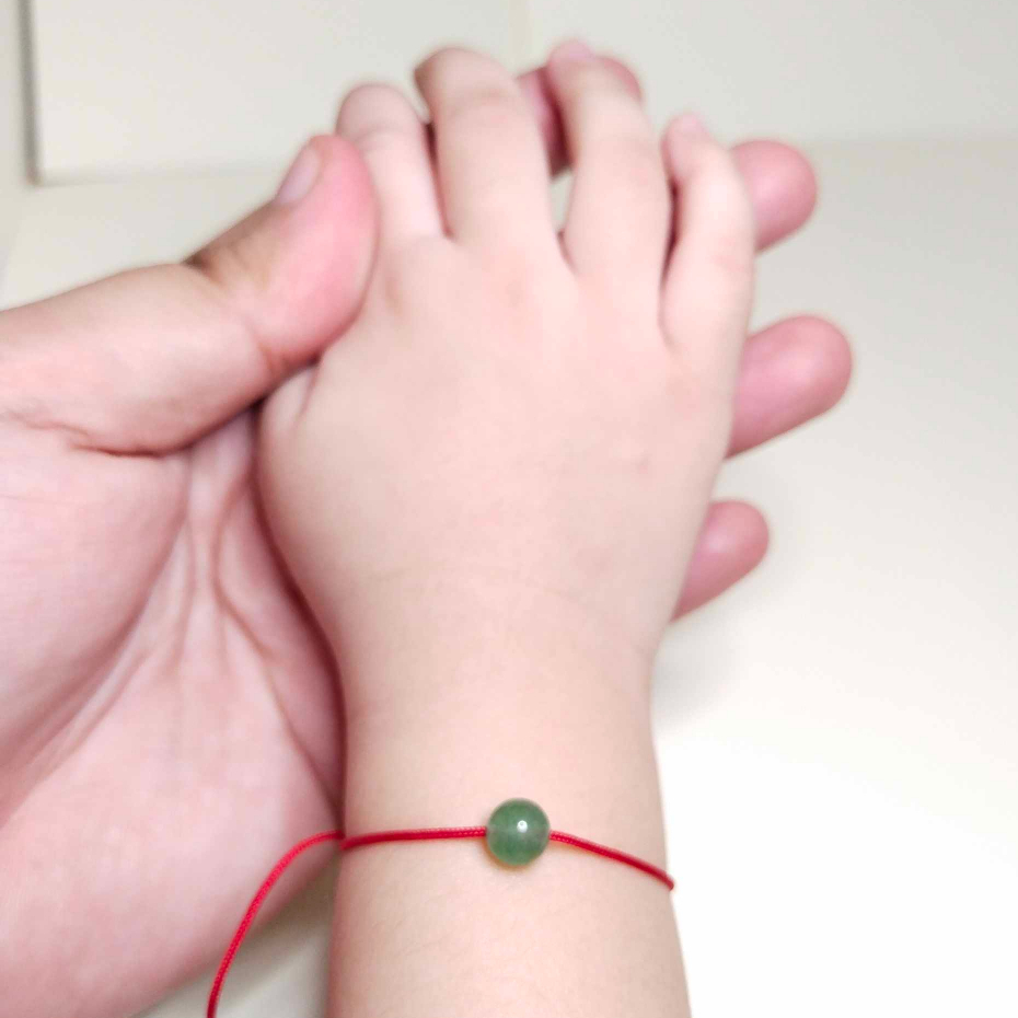 Red bracelet hot sale for babies