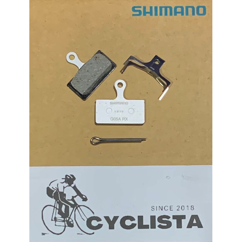 Pastiglie Freno A Disco Shimano G05A-RX &ndash; Resina Con Molla &ndash; Piastra Alluminio