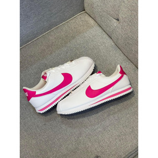 Hot pink best sale nike cortez