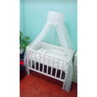 Baby cot with adjustable 2024 side