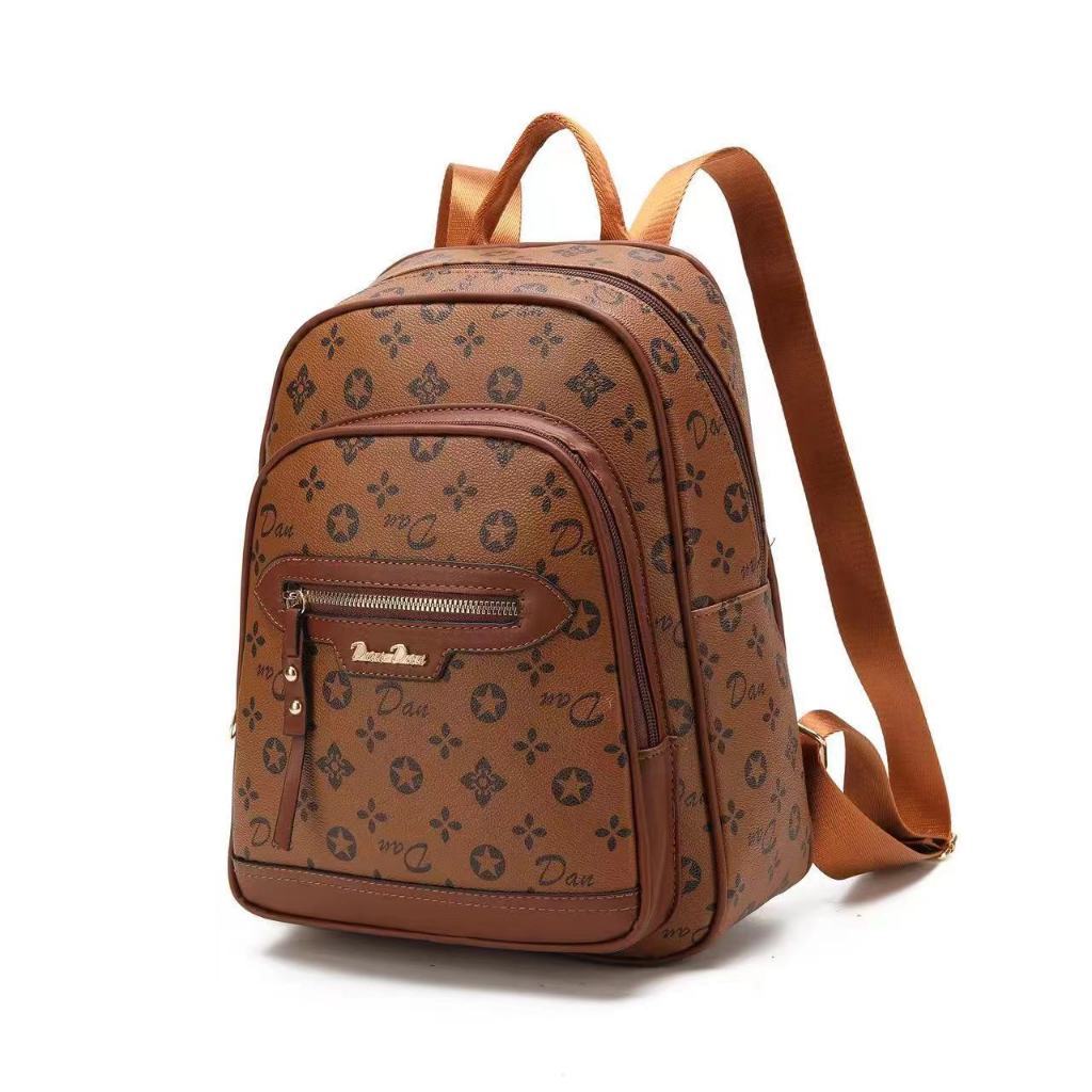 backpack with leather diamond Here's What the Diamond Tab on Your Backpack Is