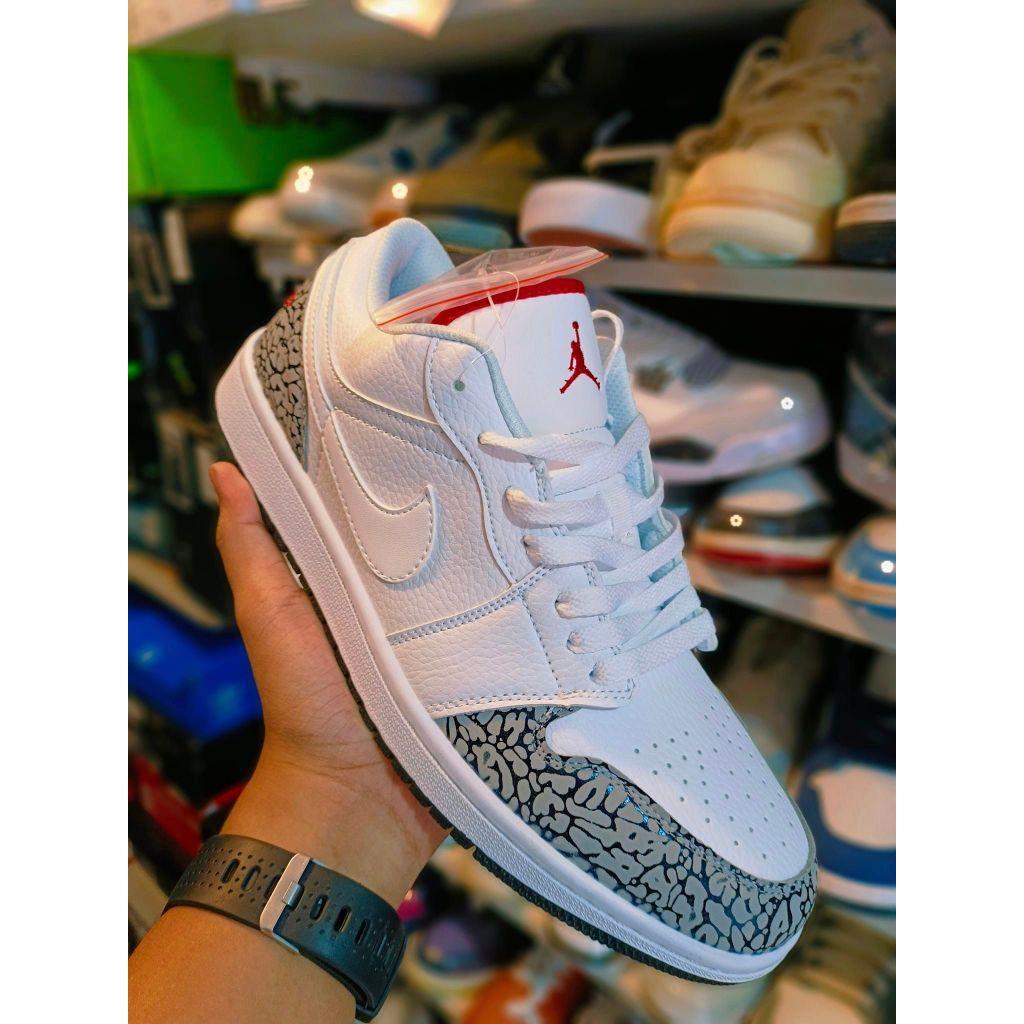 Jordan 1 low white cement best sale