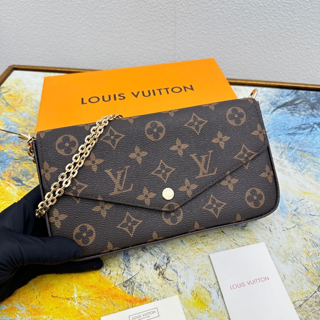 Small louis vuitton purse with hot sale gold chain