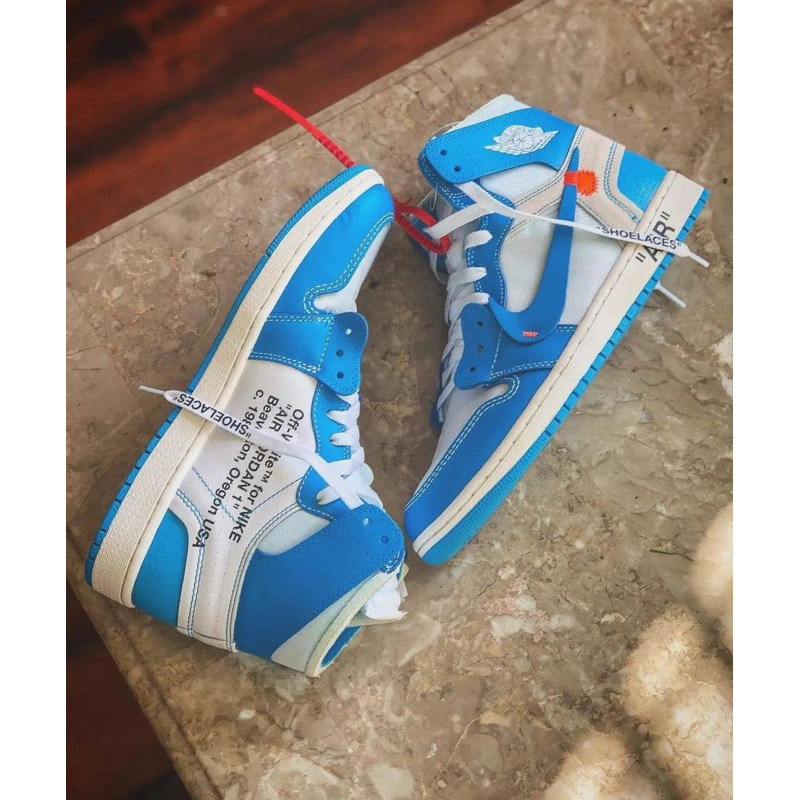 Ua off white jordan hotsell 1 unc