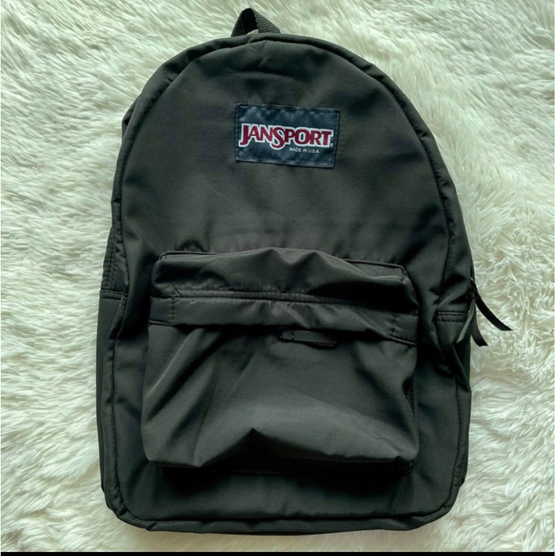 Black jansport outlet backpack in stores