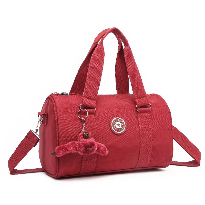 Kipling 519 womens cylindrical bag handbag shoulder bag 31 14 19cm