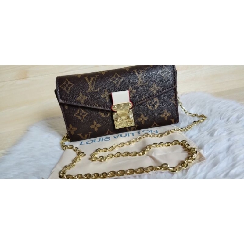 Lv chain sling discount bag