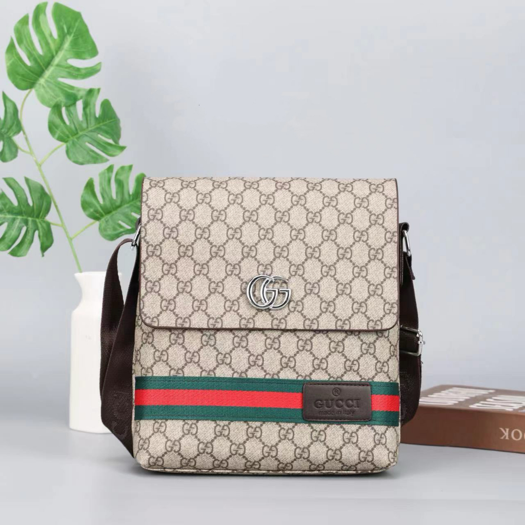 Gucci luggage mens store